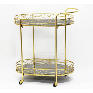 Сервірувальний столик на колесах металевий зі скляною стільницею 68*43*76 см. золотистий B480314
